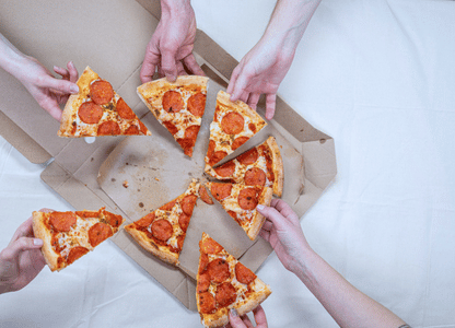 People sharing a pizza