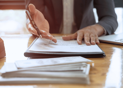 A person handling a contract